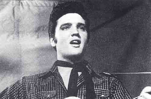 Elvis Presley in a vintage Rockmount check western shirt