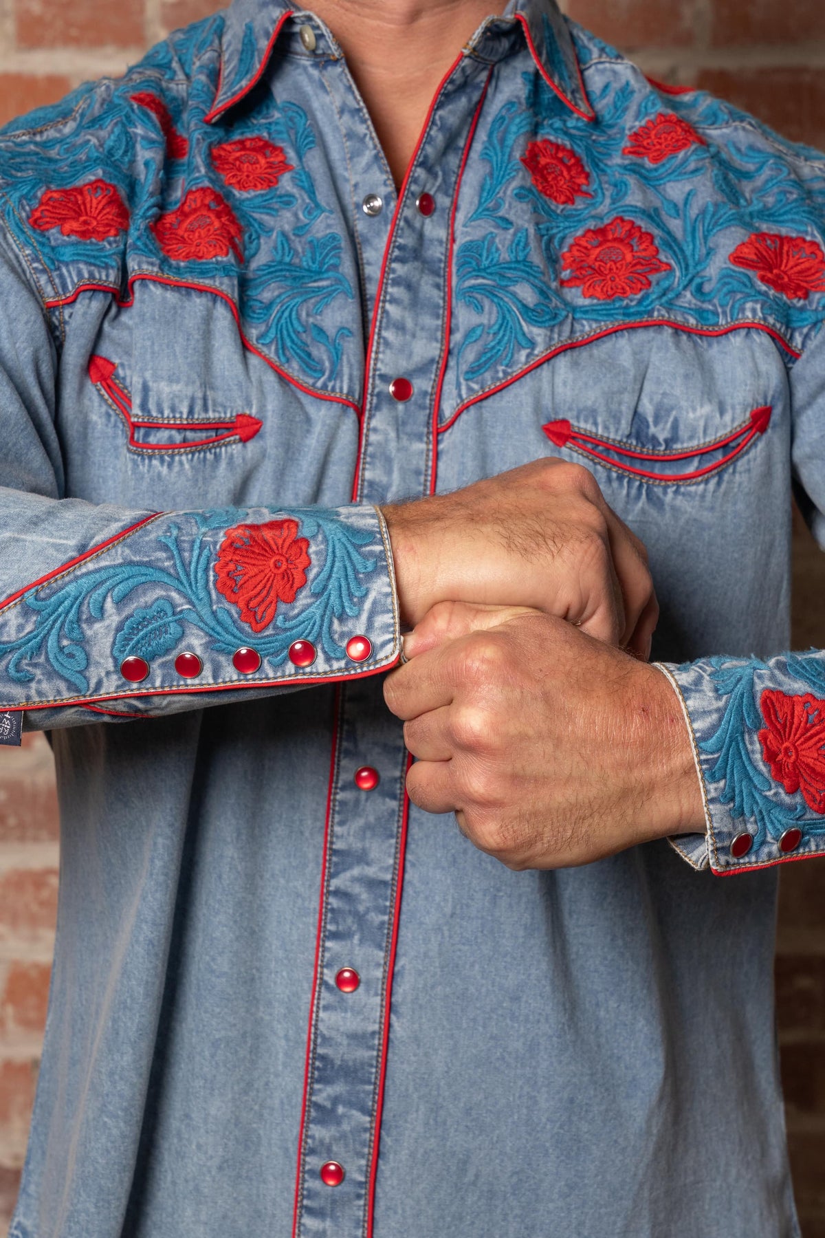 Men's vintage denim red floral western shirt by Rockmount Ranch Wear with embroidered snap button cuffs